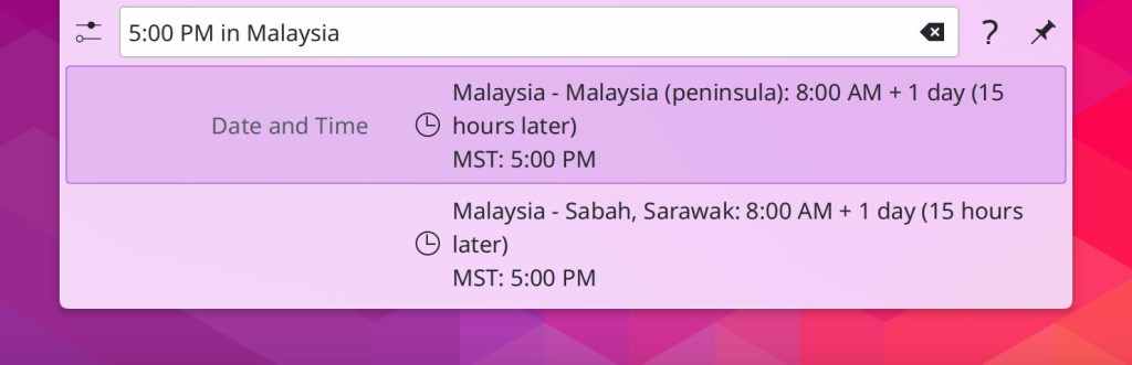 KRunner with search text "5:00 PM in Malaysia" showing that the time in Malaysia would be 8:00 AM the next day